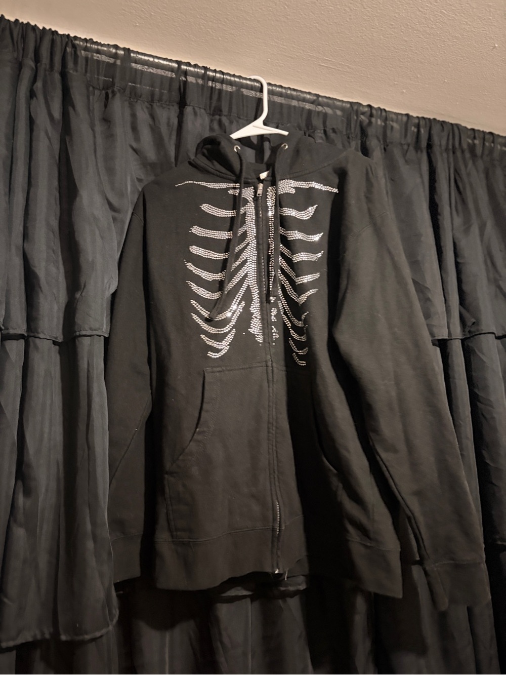 Black Zip-Up Hoodie with Rhinestone Ribcage Design